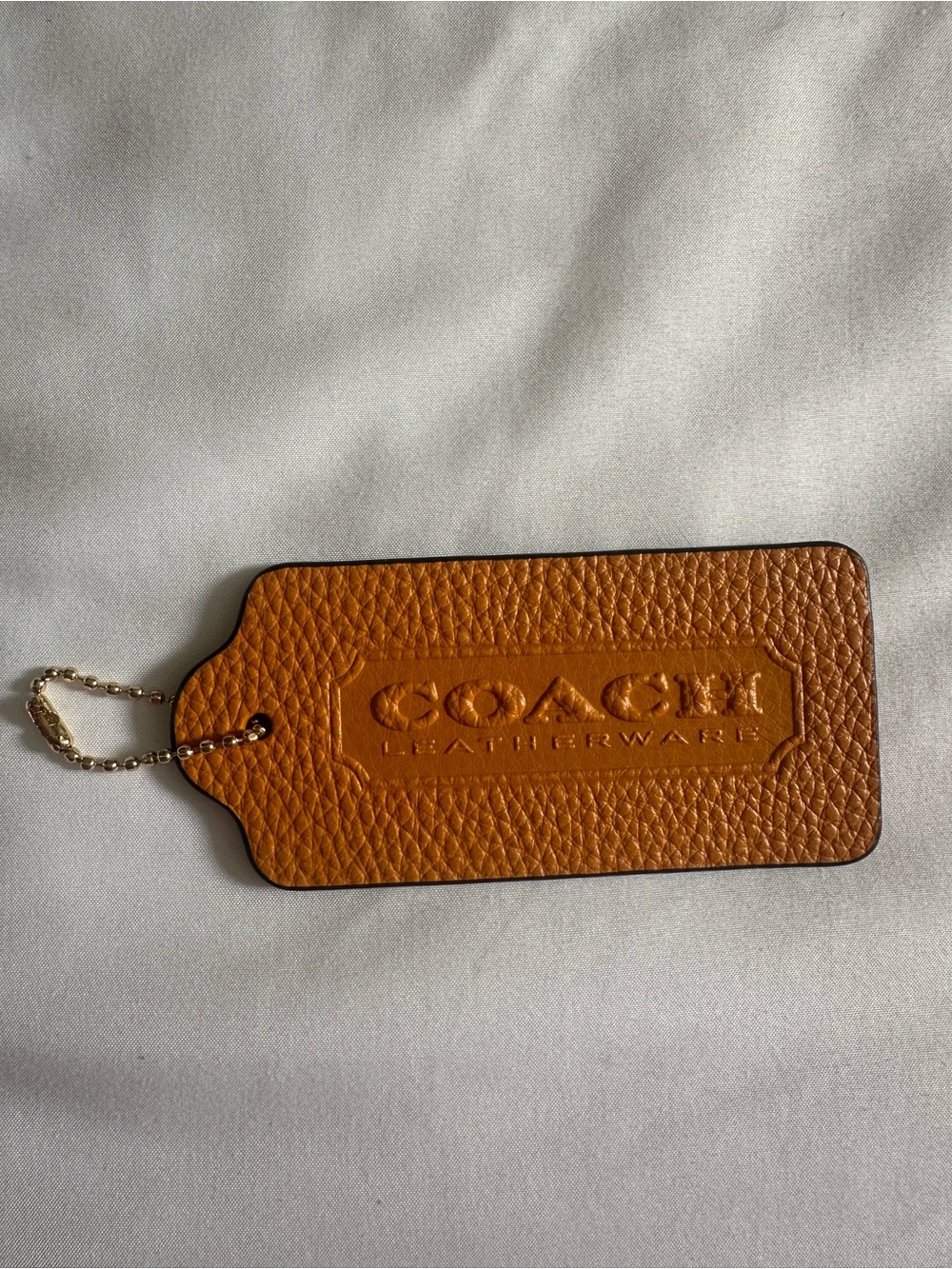 Coach tag